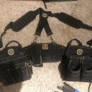 Brand new Rack-A-Tier Electrician tool belt/ side pouches and suspenders. Size XL