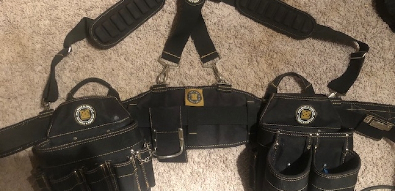 Brand new Rack-A-Tier Electrician tool belt/ side pouches and suspenders. Size XL